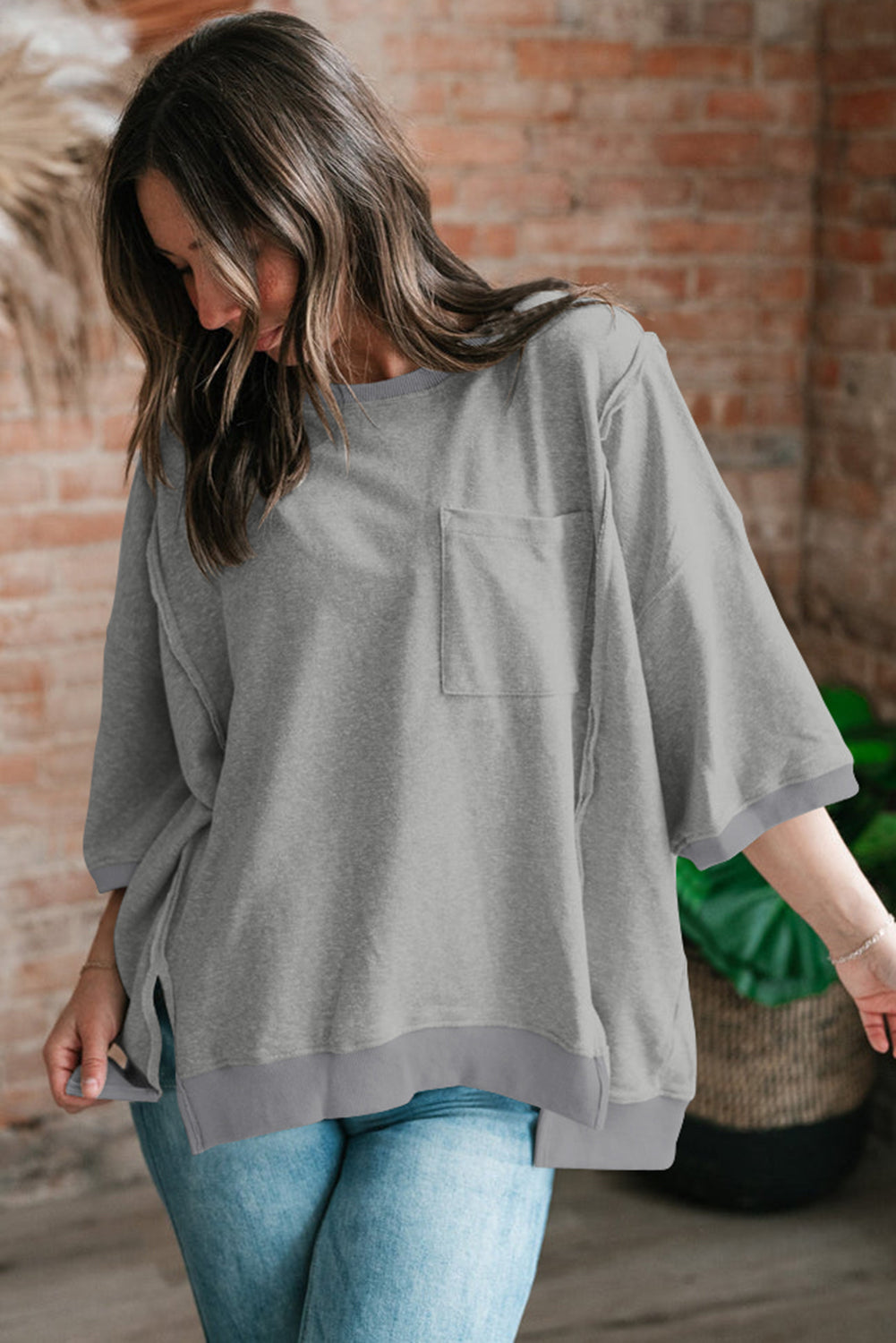 Bonbon Exposed Seam Pocket Side Split Loose T Shirt